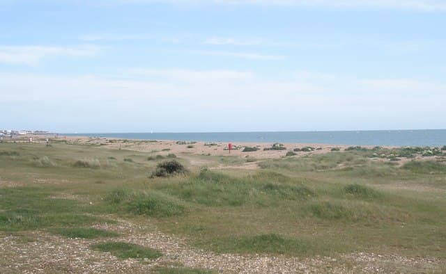 A fine spring afternoon on Hayling Island beach, looking along the shore